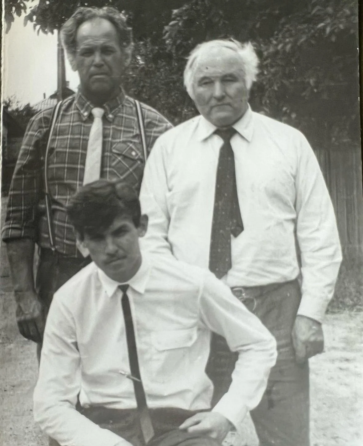Three generations of Lisun craftsmen in a historic family photograph